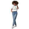 mixed black girl in white christian t-shirt with black and gold letters